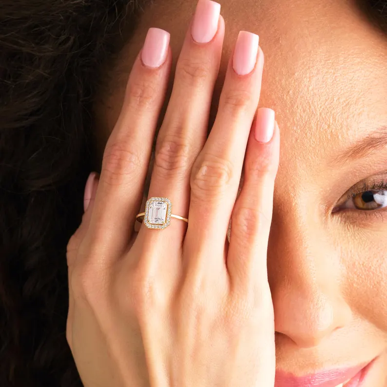 Emerald cut engagement ring